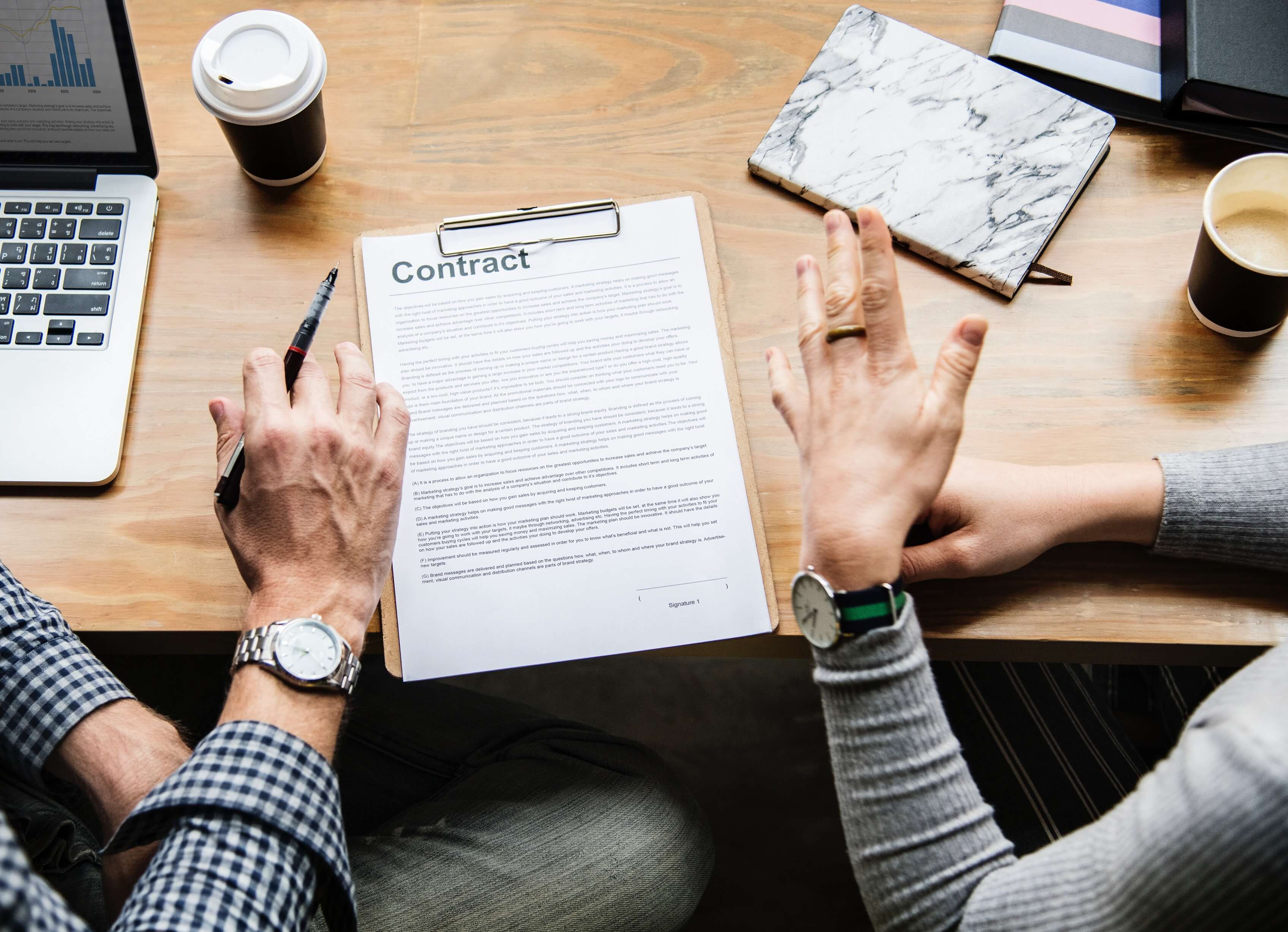customer signing contract with business