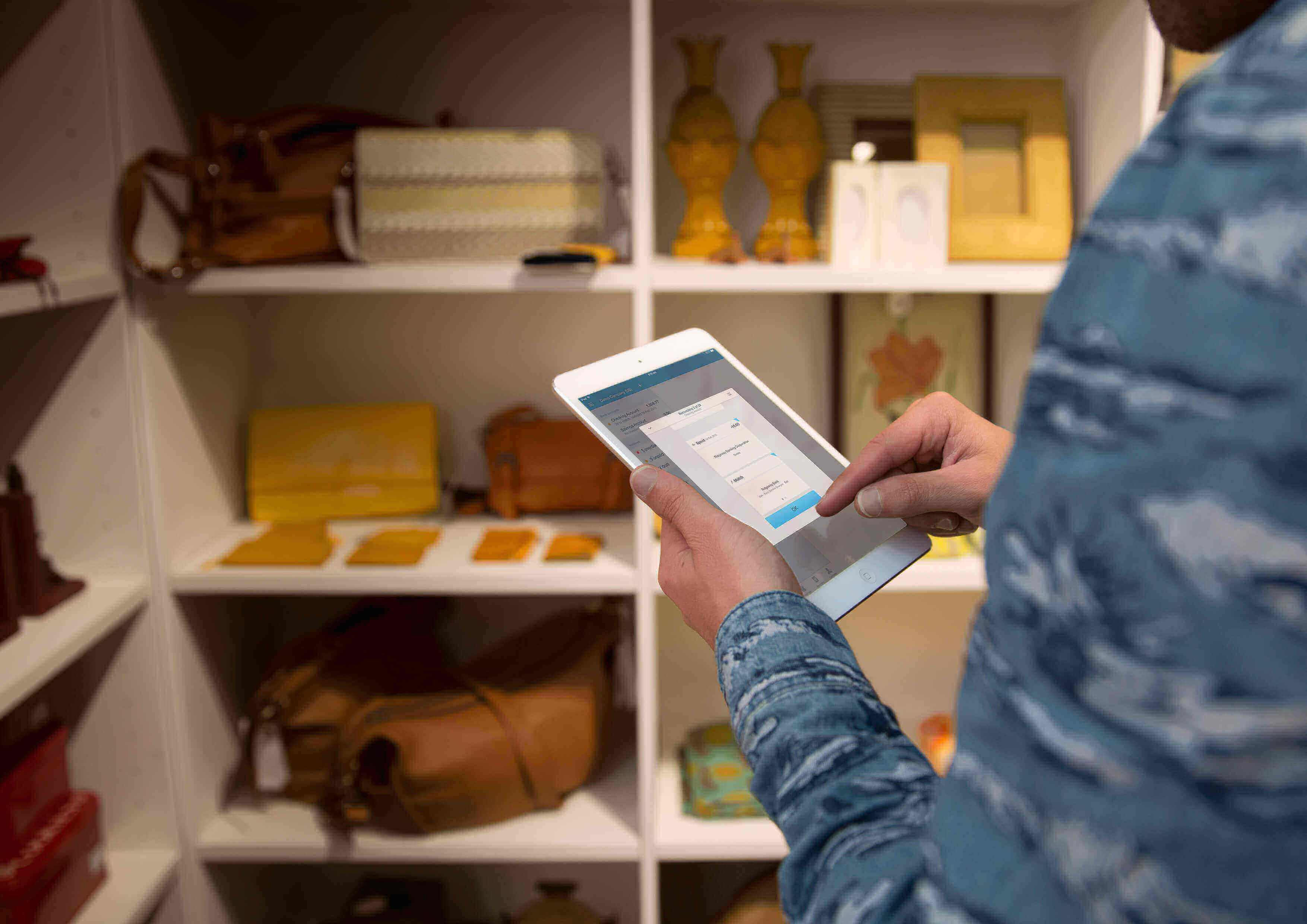 Person on their tablet looking at the real time numbers for their business using Xero accounting software.